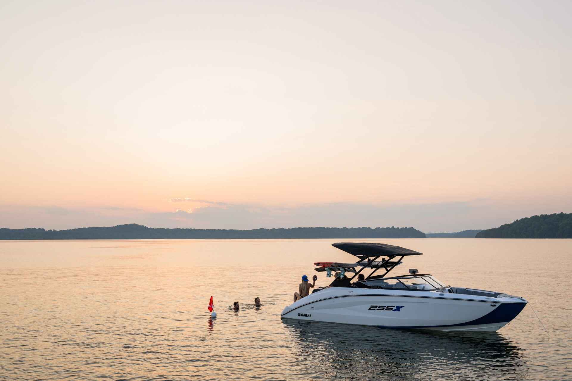 Yamaha boat on the water at sunset