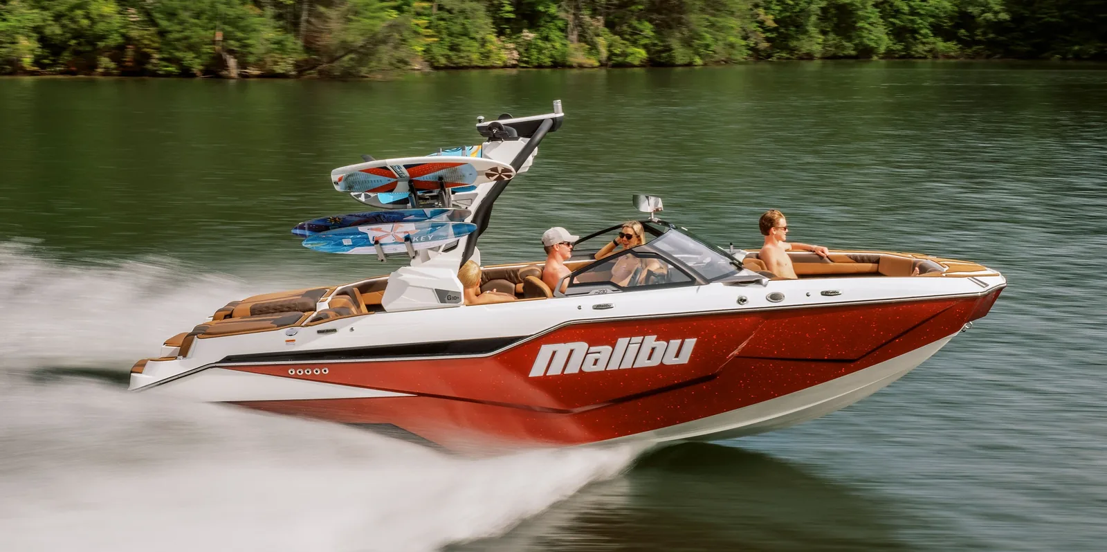2026 Malibu M230 wakesurf boat cruising on a lake