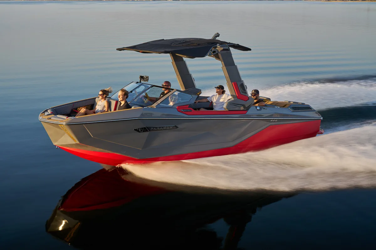 2027 Nautique Paragon P23 wakesurf boat cruising on calm water
