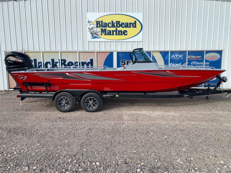 Red 2027 G3 Sportsman 2400 fishing boat on its trailer outside Blackbeard Marine in Kingston, OK