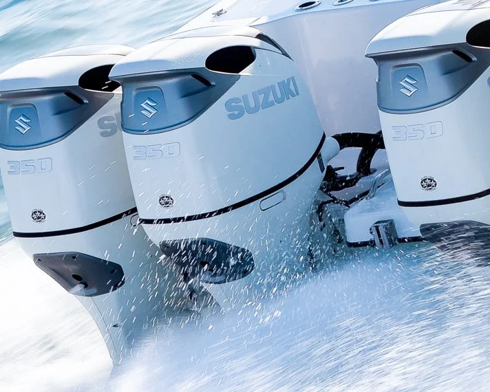 Four Suzuki DF350A outboard motors running at speed
