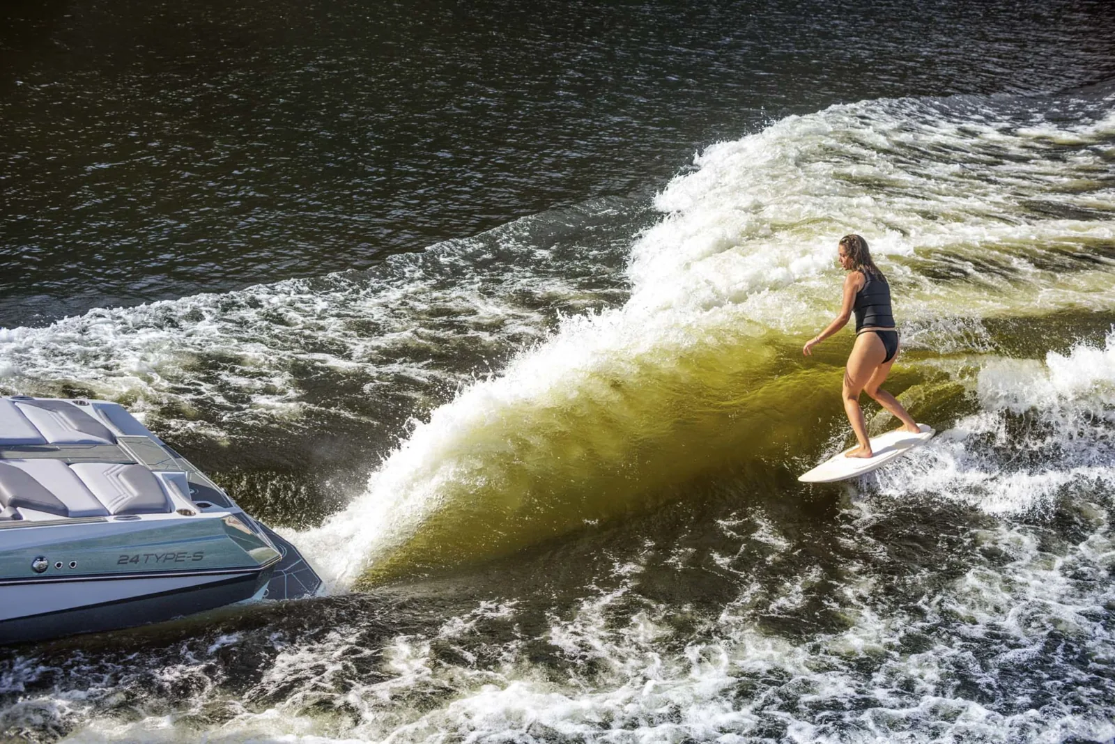 Surfer behind an ATX 24 Type S